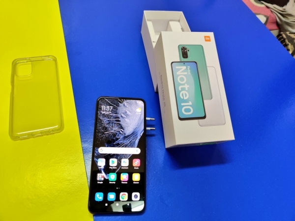 Распаковка и живые фотографии Xiaomi Redmi Note 10